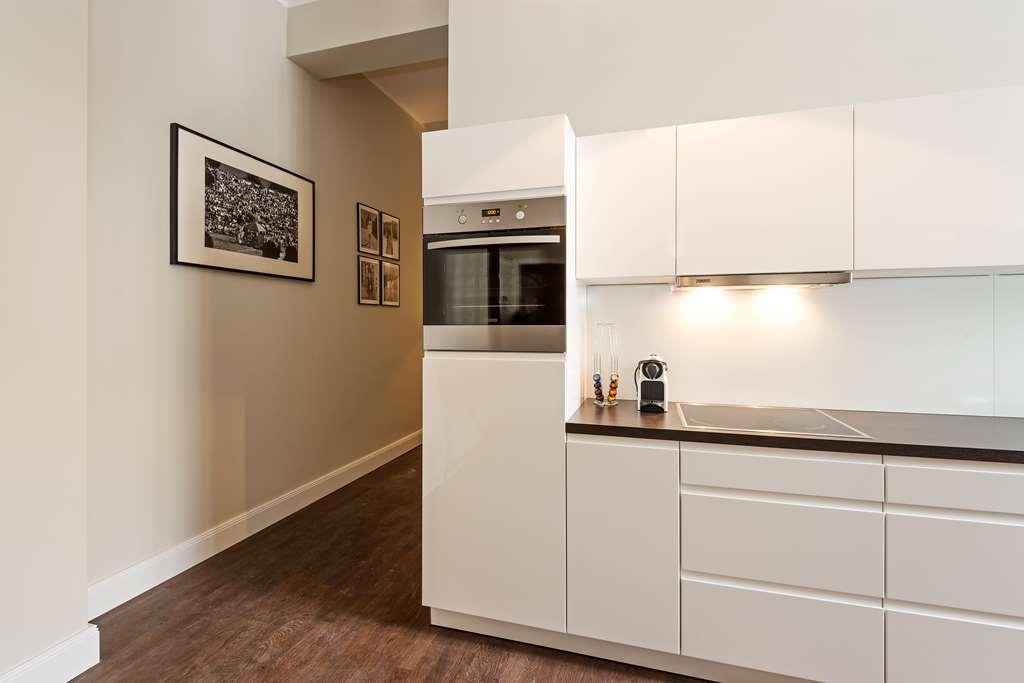 Arabel Design Apartments Berlín Restaurante foto A modern German kitchen