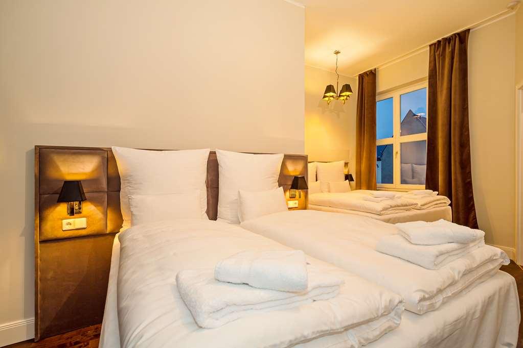 Arabel Design Apartments Berlín Habitación foto A bedroom at the hotel